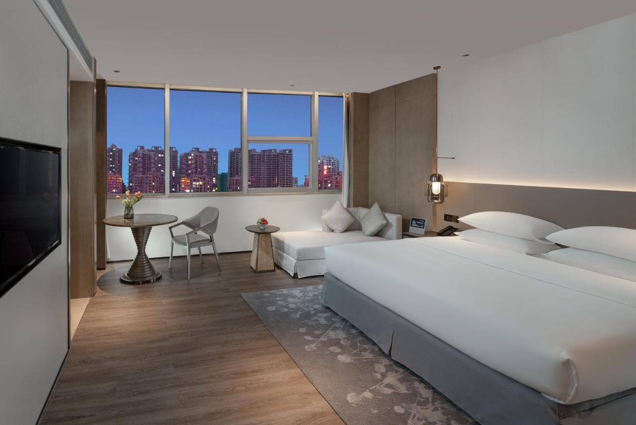 Golden Shining New Century Grand Hotel Beihai Exterior photo