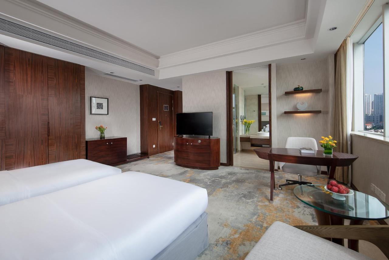 Golden Shining New Century Grand Hotel Beihai Exterior photo