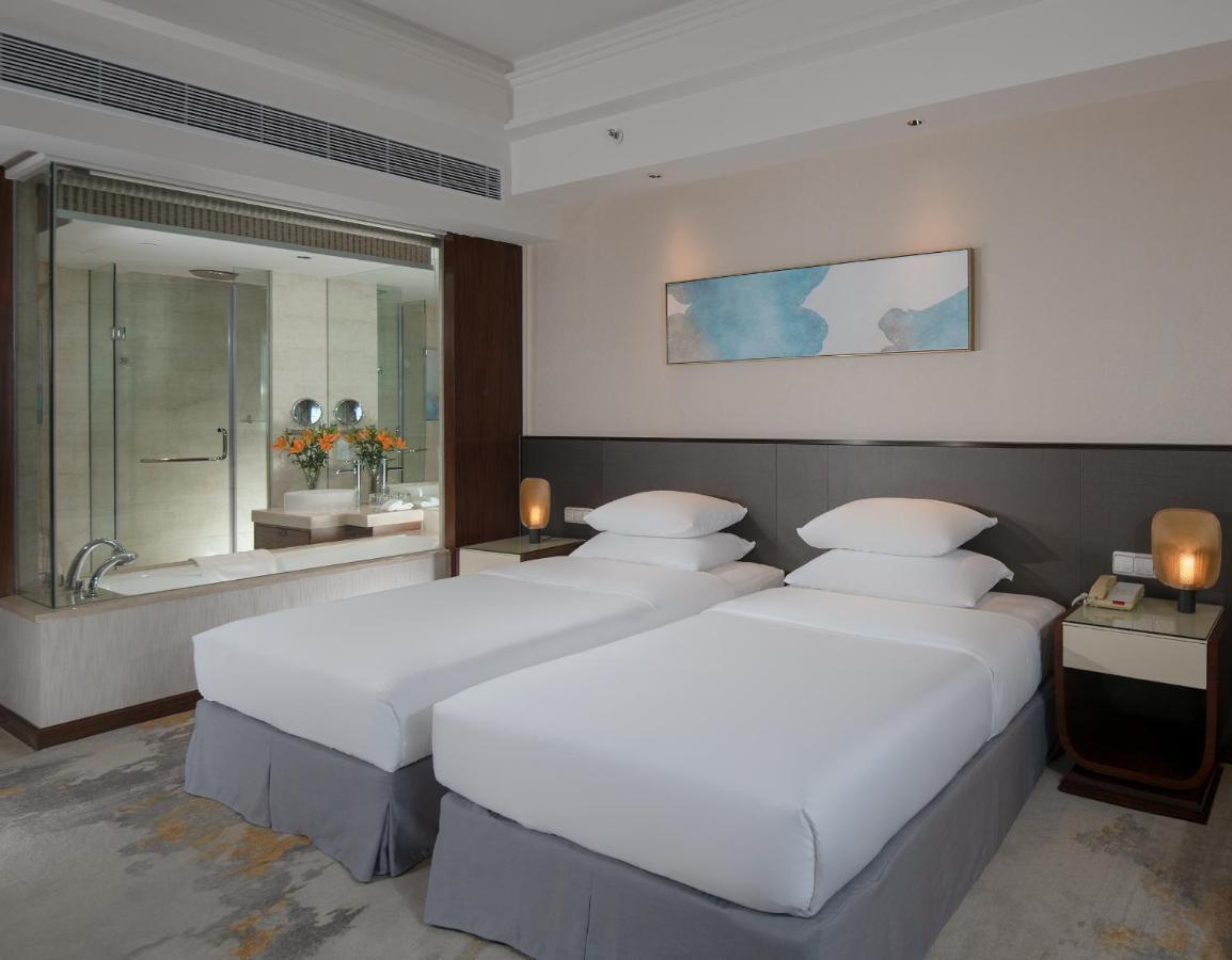 Golden Shining New Century Grand Hotel Beihai Exterior photo