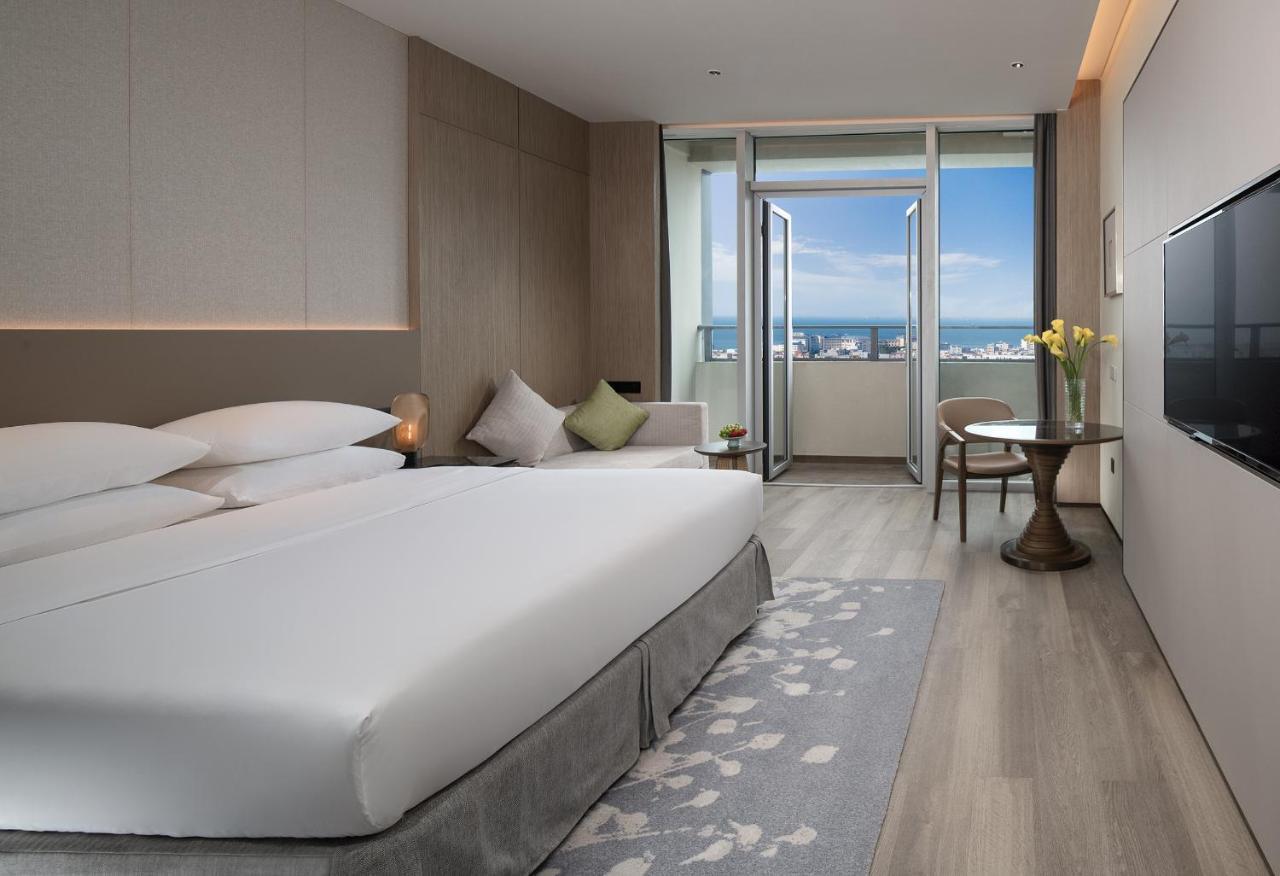 Golden Shining New Century Grand Hotel Beihai Exterior photo